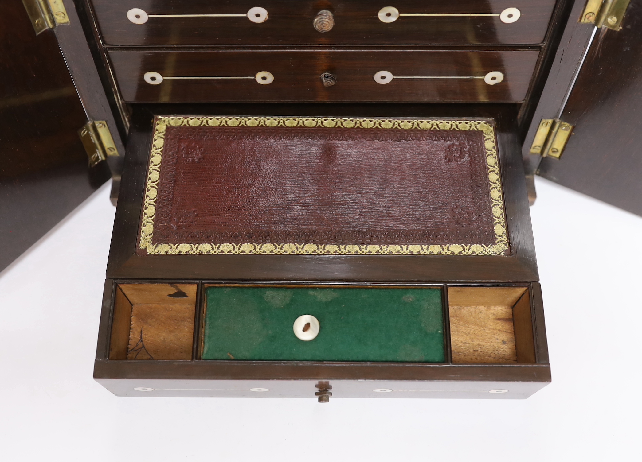 A William IV rosewood and cut mother of pearl table top sewing cabinet, 27cm, high, 28cm wide, 23.5cm deep